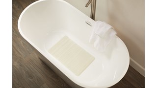 Safti-Grip® Bath Mat is perfect for a shower stall or bathtub. Suction-backed to stay firmly in place. Latex-free construction. Textured surface prevents slippage. Shower mat is perforated for improved drainage. Mildew-resistant.