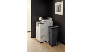 Stationary containers provide convenient central collection sites for multiple work stations or areas.