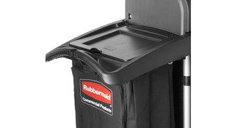 The Rubbermaid Commercial Waste Cover for High-Capacity Janitorial Cleaning Carts covers waste collection from guests and patrons.