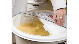 The Rubbermaid Commercial ProSave® Sliding  Lid and scoop for 36 L BRUTE® ingredient container